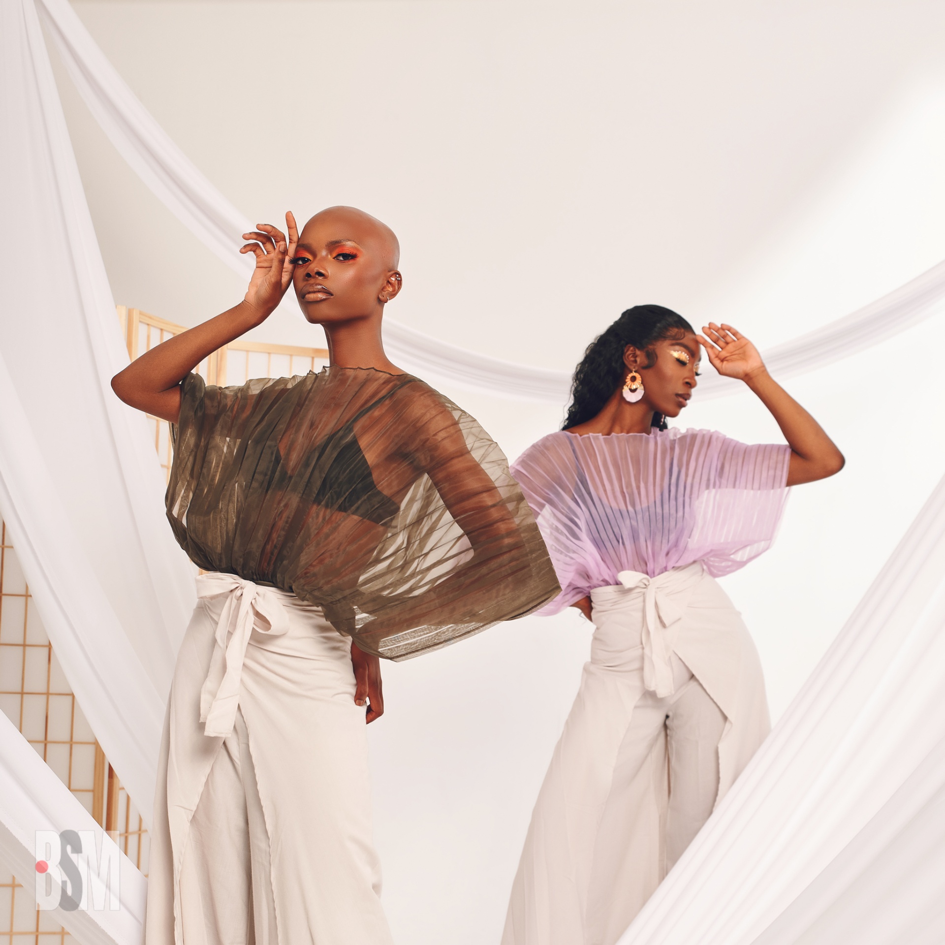 Two creators in editorial pose